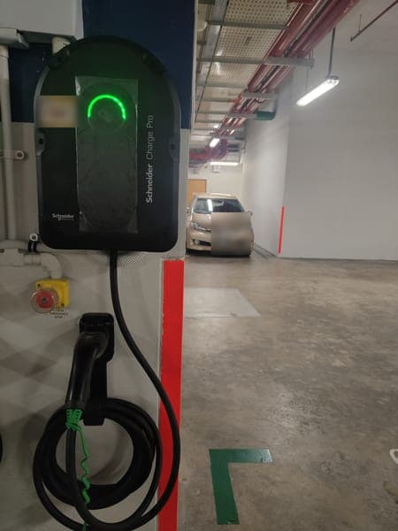 Schneider Charge Pro wallbox on a column in a basement car park